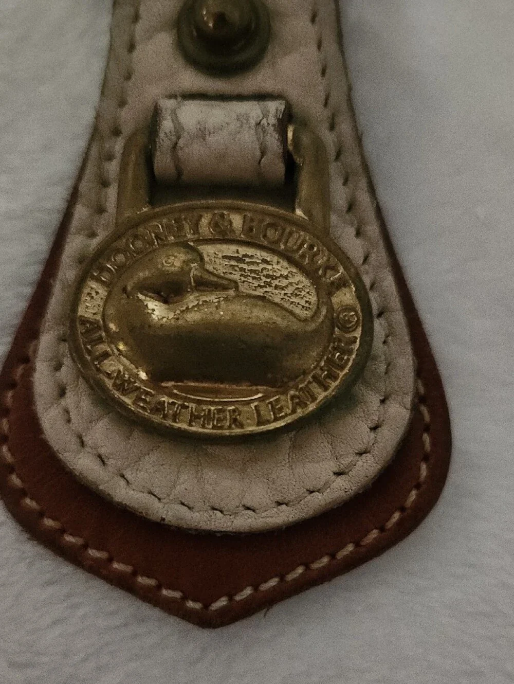 Dooney & Bourke Brown and Cream Leather Key Fob with Brass Medallion